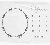 a calendar with a wreath on the front of it